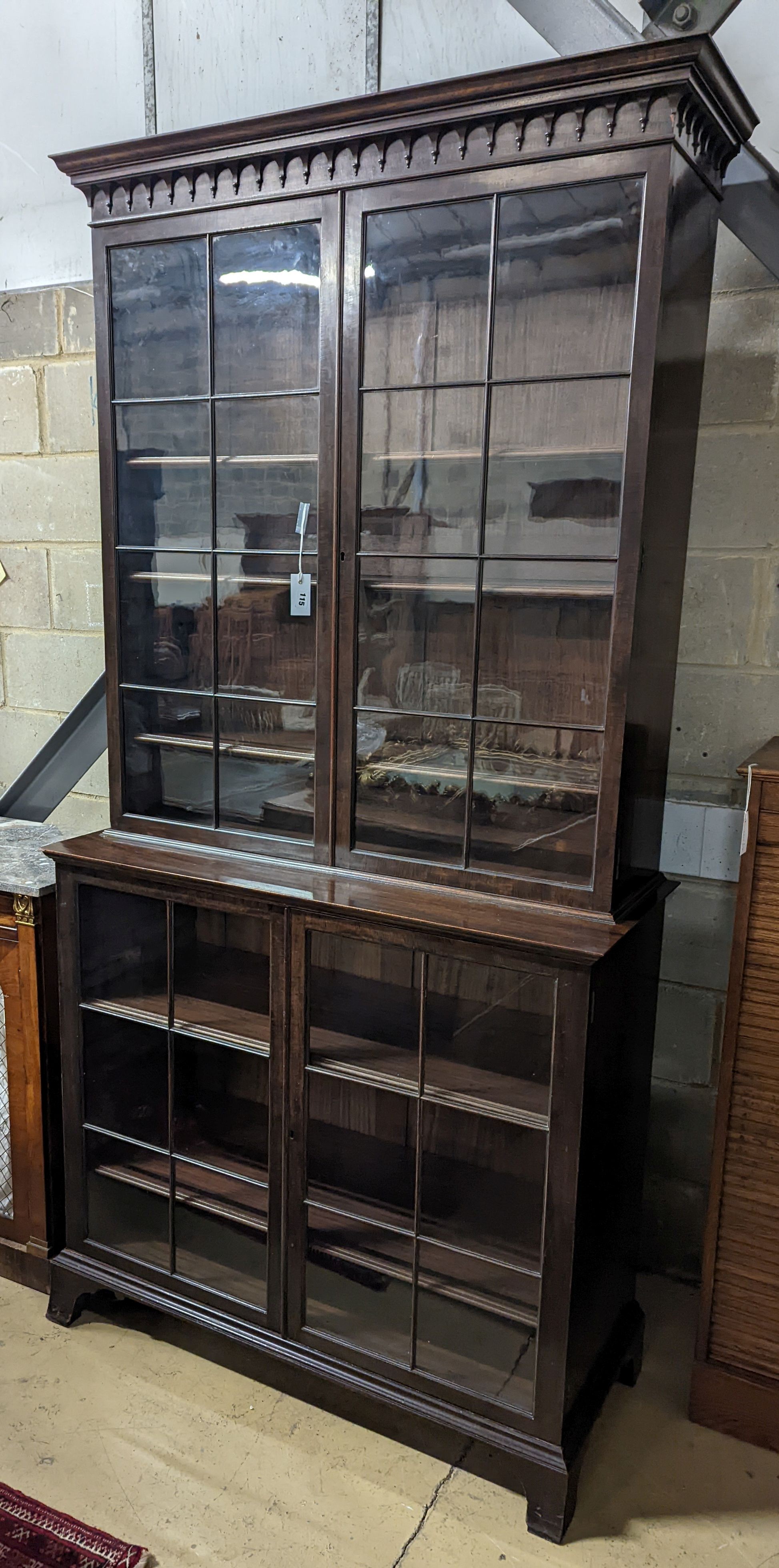 An Edwardian George III style glazed mahogany bookcase, width 113cm, depth 47cm, height 225cm